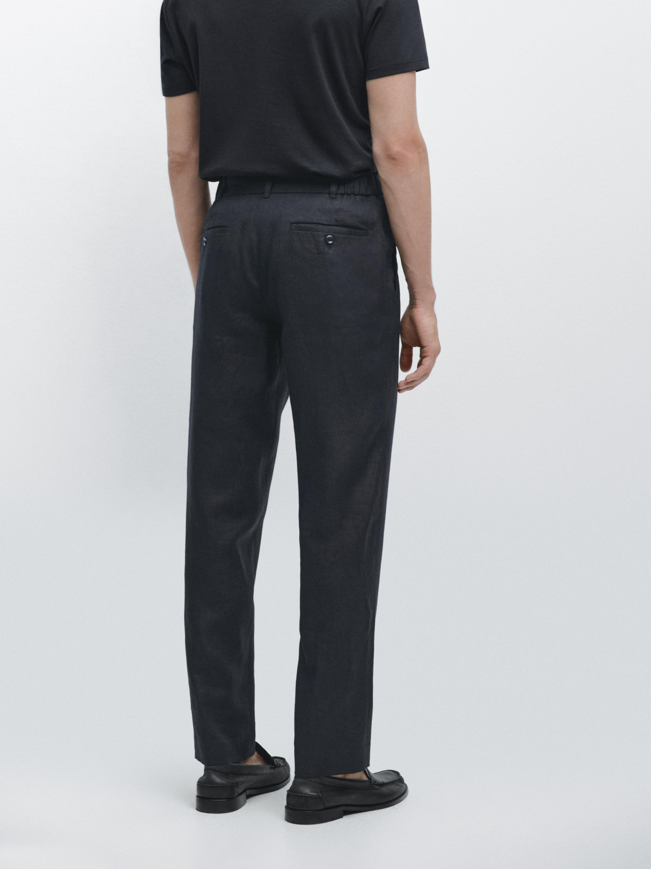 Tapered fit linen trousers